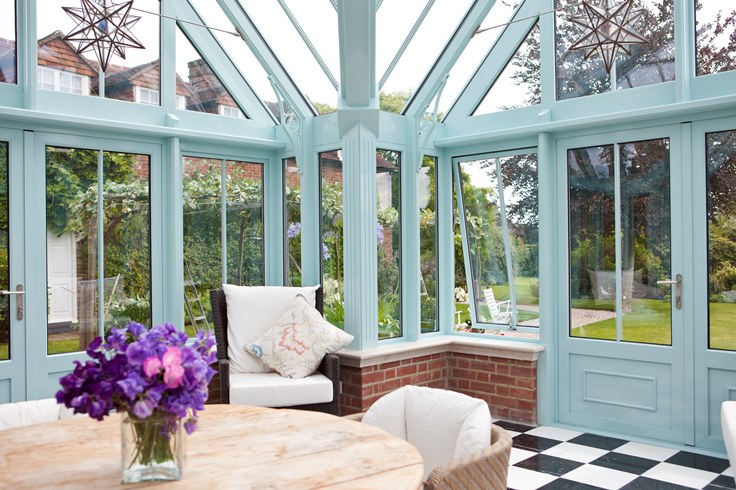 Blue conservatory with chequerboard flooring