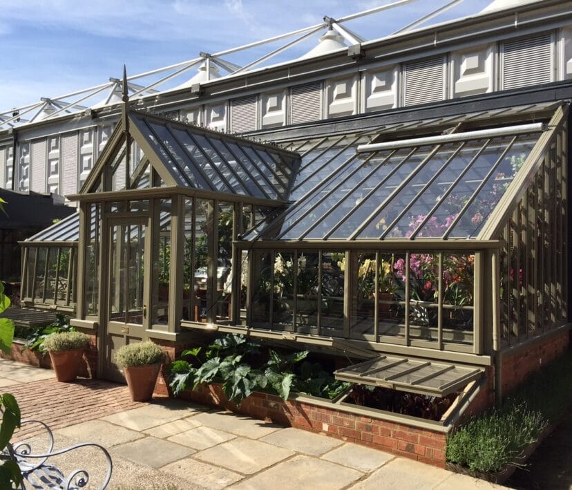 Large, bespoke, lean-to, mono-pitch greenhouse in Green Sand