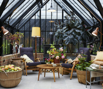 Beautifully decorated inside of a greenhouse, spacious and floral