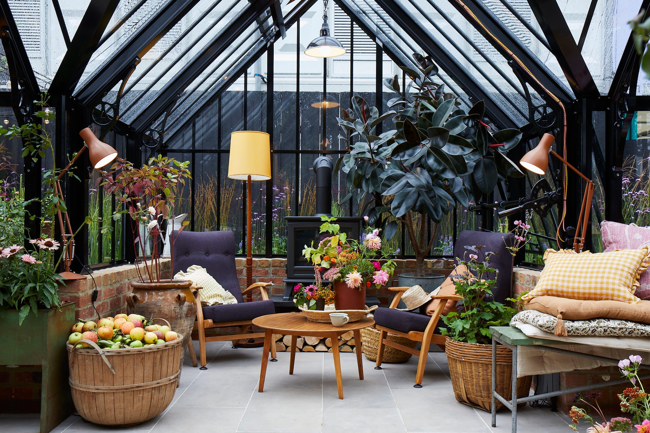 Beautifully decorated inside of a greenhouse, spacious and floral