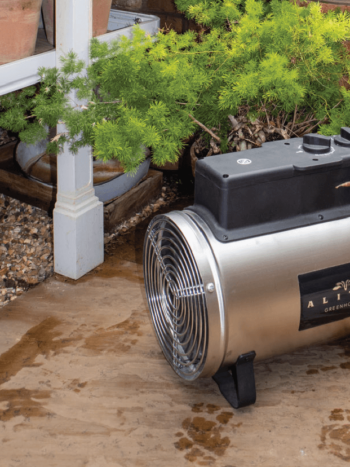 Electric Greenhouse Heater on the floor of an Alitex Greenhouse