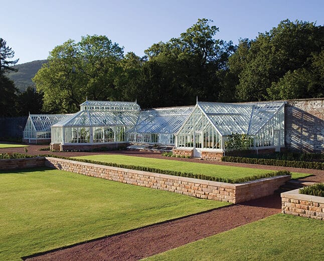 Alitex glasshouse in large walled garden with raised beds, gravel paths & lawn. The Spa in the Walled Garden