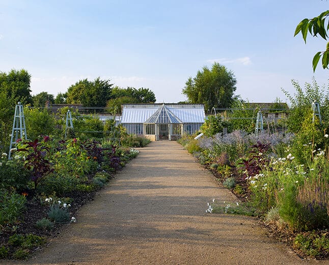 Ramsey Walled Garden Glasshouse down the path