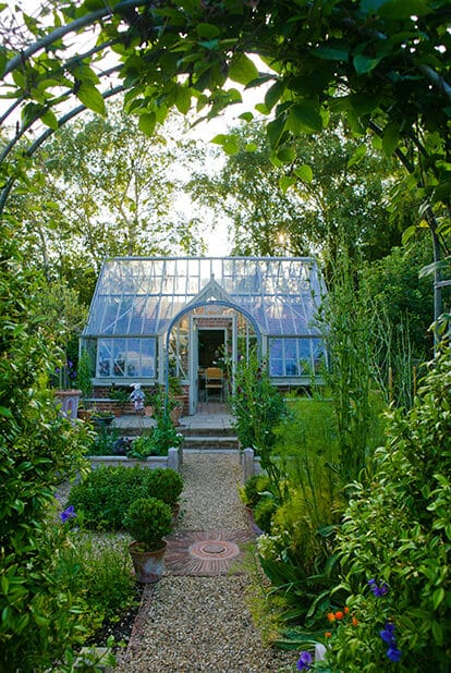 Victorian Greenhouse enclosed with greenery