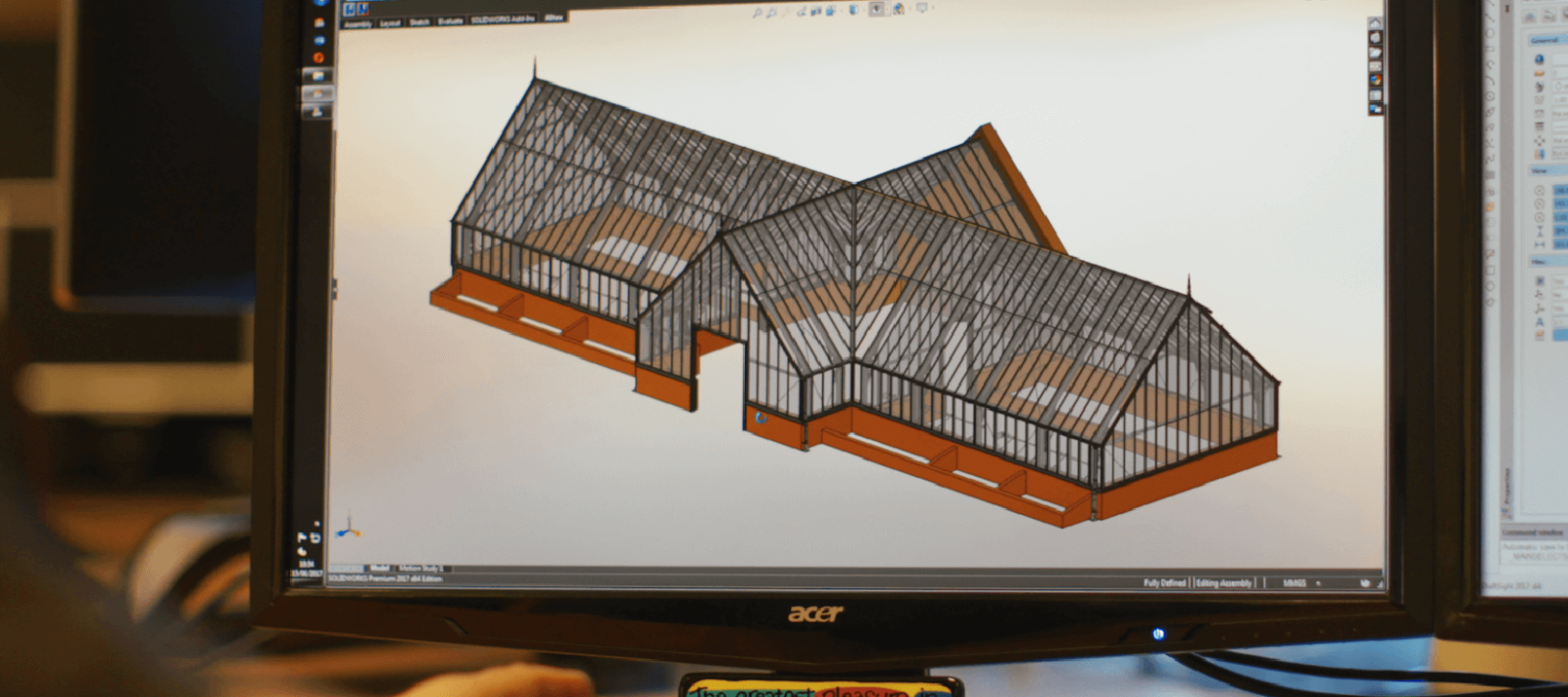 3D plans of a greenhouse design on a computer screen