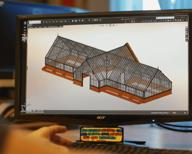 3D plans of a greenhouse design on a computer screen