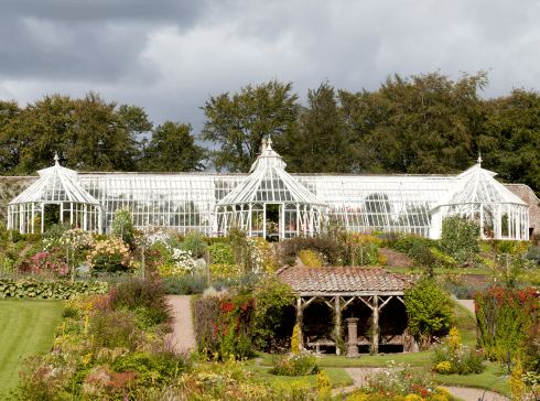 Large bespoke greenhouse in white.