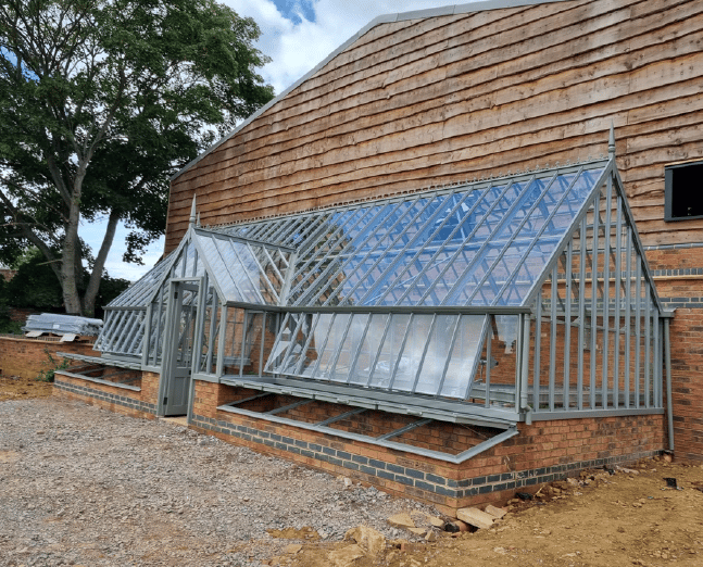 Alitex Greenhouse midway being built