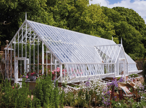 Traditional glazing system in lean to greenhouse