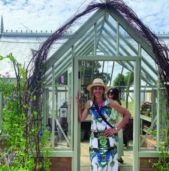 Helier at Hampton court flower show in front of Alitex tatton greenhouse