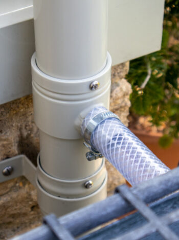 Rain Water Diverter on the downpipe of an Alitex glasshouse