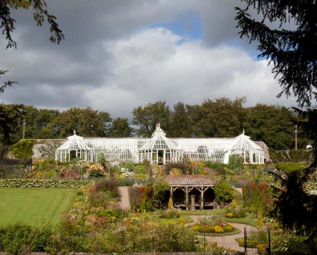 walled garden with greenhouse