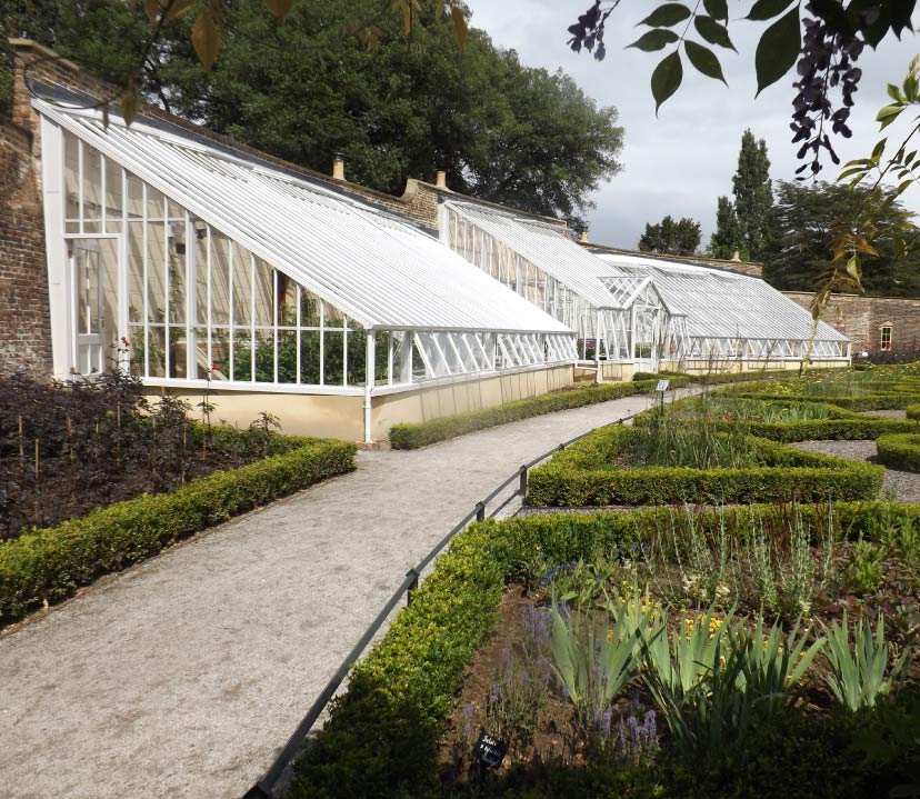 walled garden with greenhouse