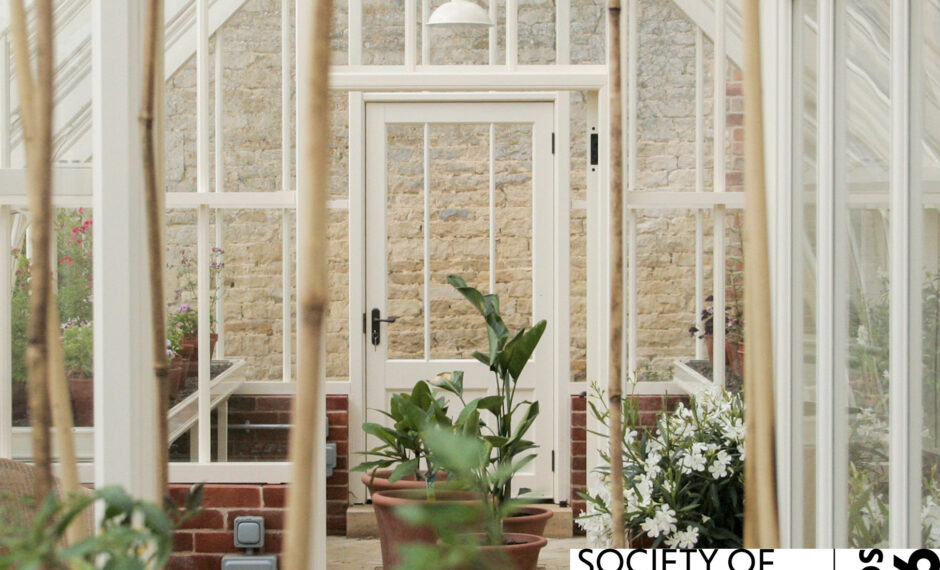 Inside Alitex glasshouse with SGLD logo and 'gold sponsor' wording on it