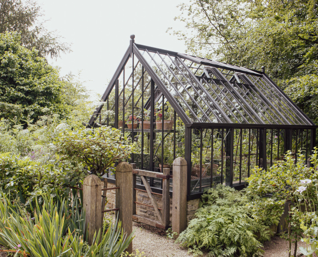 Alitex black greenhouse in urban garden
